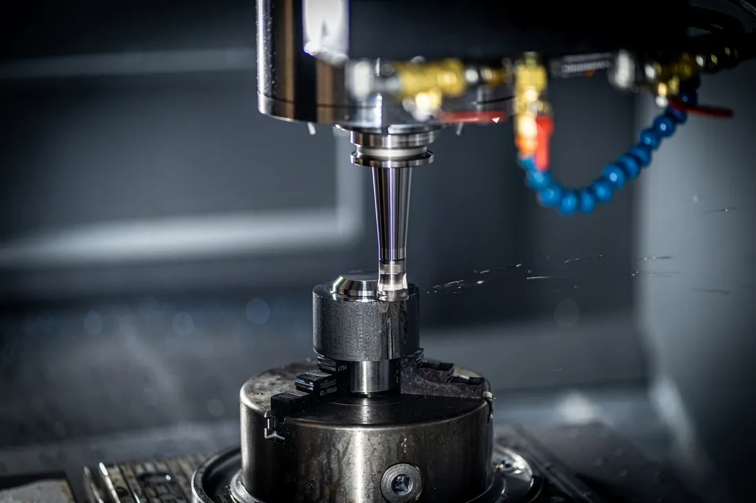 CNC machine spindle with a coolant supply line