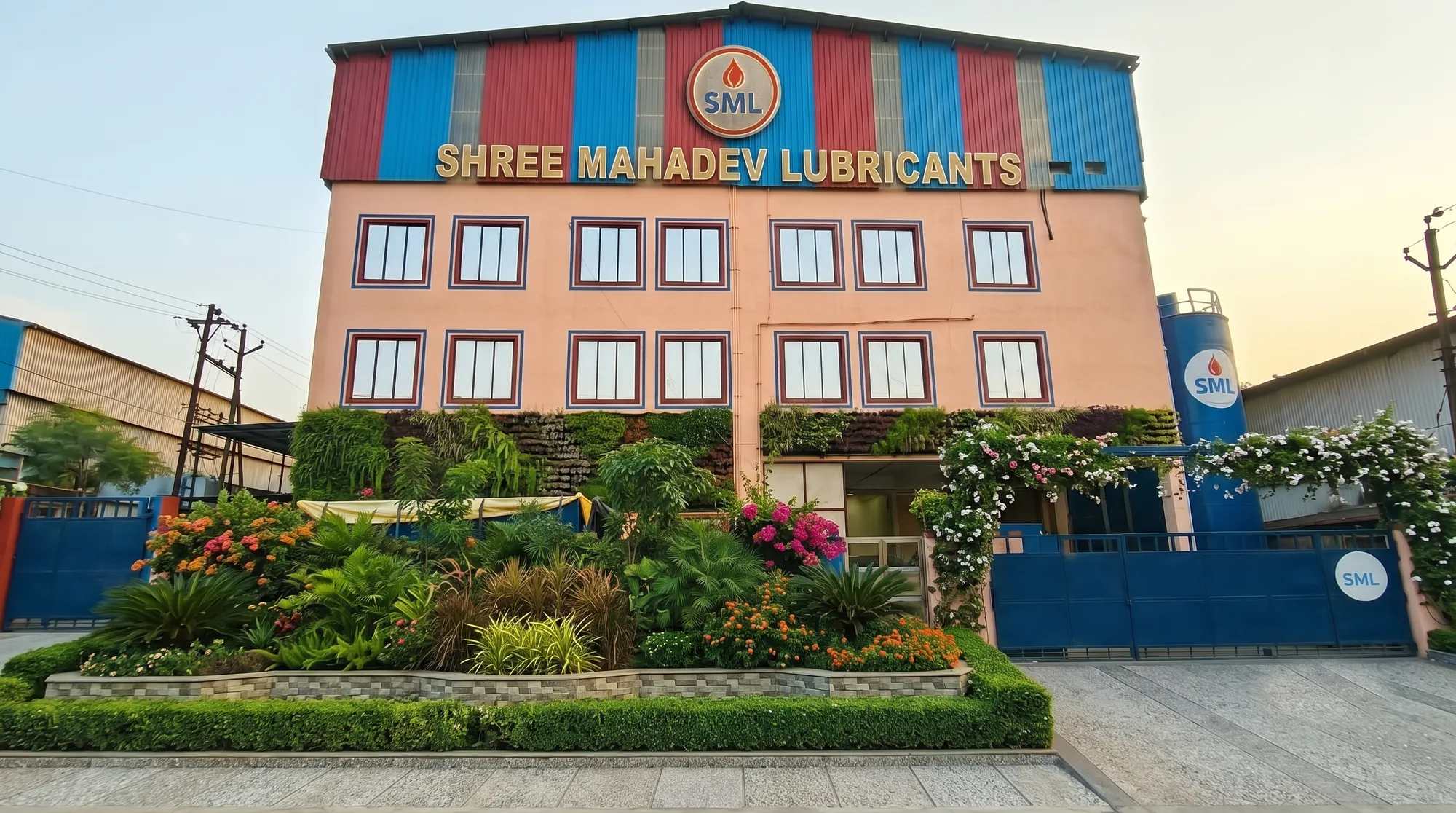 Shree Mahadev Lubricants factory building with landscaped garden and entrance gate